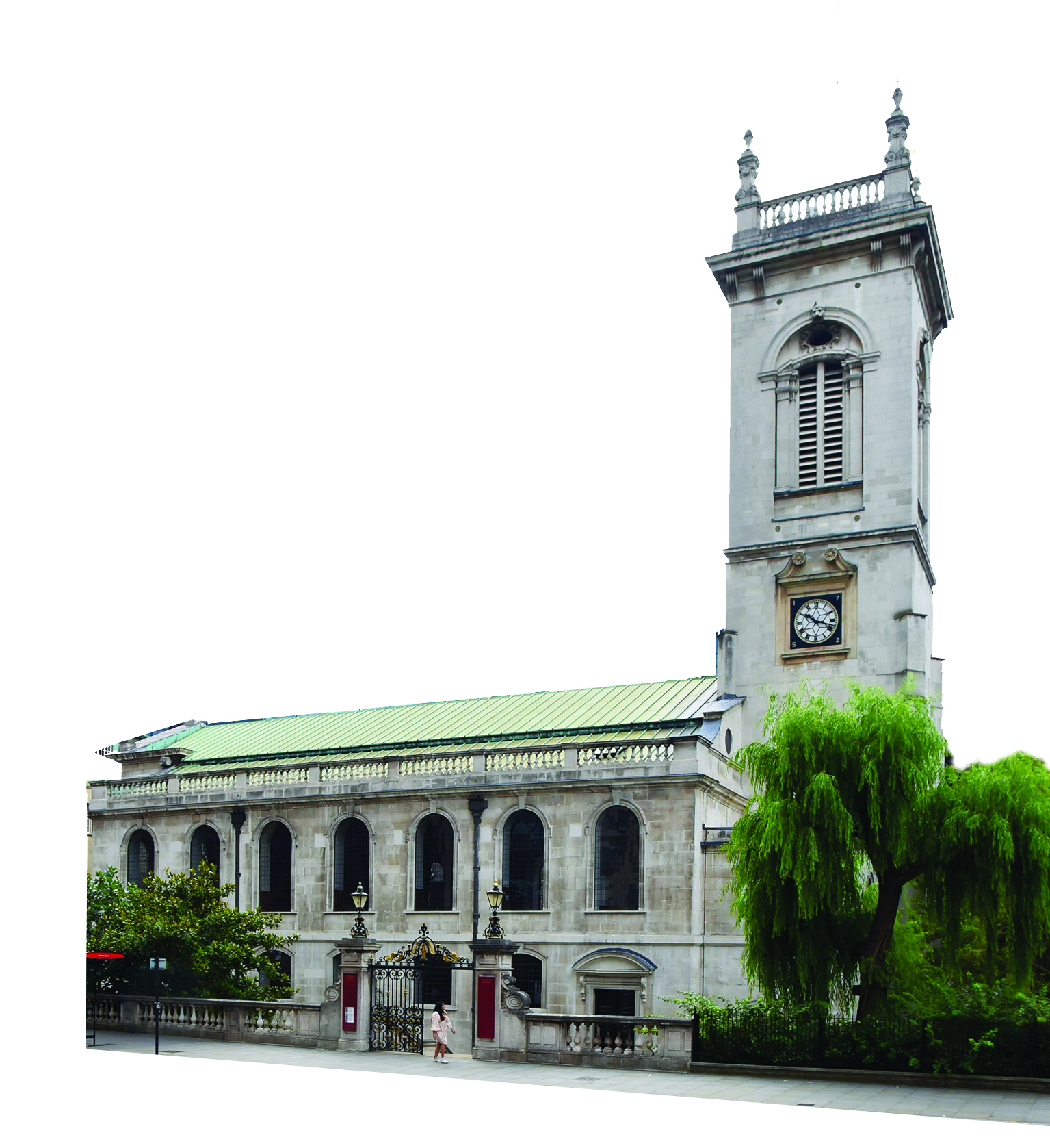 Historic stone church with a tall clock tower and green roof, surrounded by greenery.