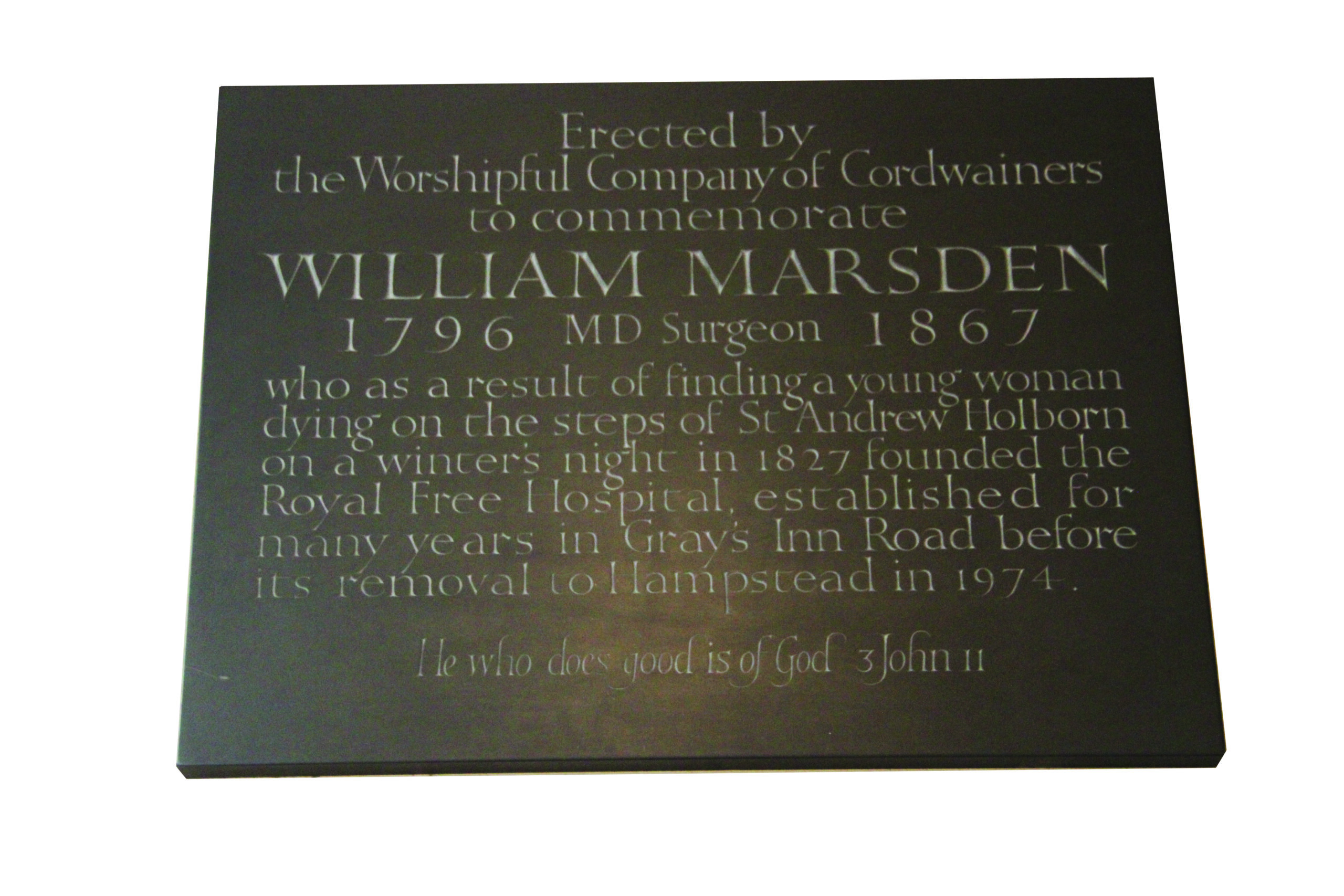 Plaque commemorating William Marsden, 1796-1867, describing his founding of the Royal Free Hospital after helping a woman in need.