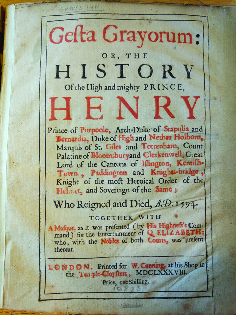 Old book cover titled "Gesta Grayorum" with ornate, bold red and black text detailing the history of Prince Henry. Aged and weathered paper.